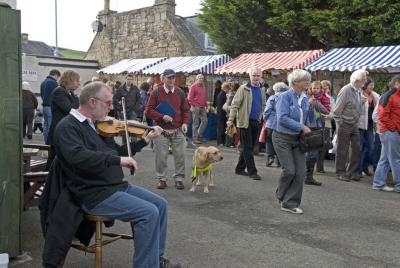 Fiddling at the market